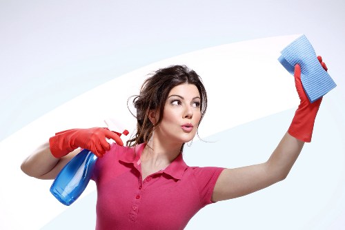 Deep cleaning team working in a SE15 home kitchen